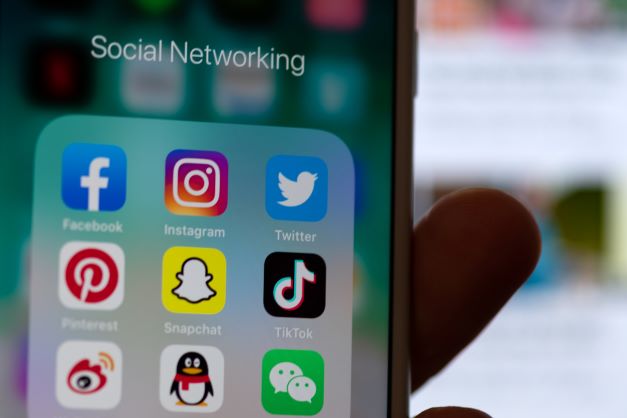 social media applications in a folder on iPhone